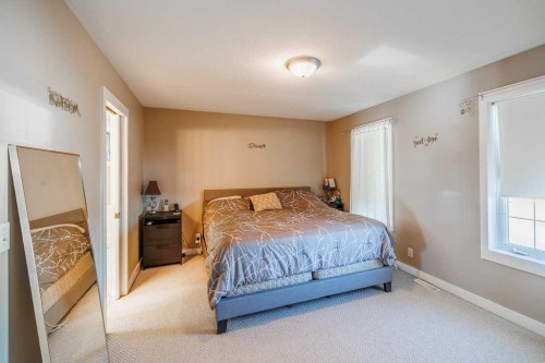 65 Fern Glade Crescent, Sylvan Lake, AB - Indoor Photo Showing Bedroom