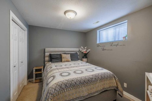 65 Fern Glade Crescent, Sylvan Lake, AB - Indoor Photo Showing Bedroom