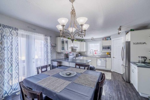 65 Fern Glade Crescent, Sylvan Lake, AB - Indoor Photo Showing Dining Room