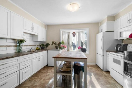 3719 50 Street, Red Deer, AB - Indoor Photo Showing Kitchen