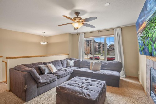 56 Ironstone Drive, Red Deer, AB - Indoor Photo Showing Living Room With Fireplace
