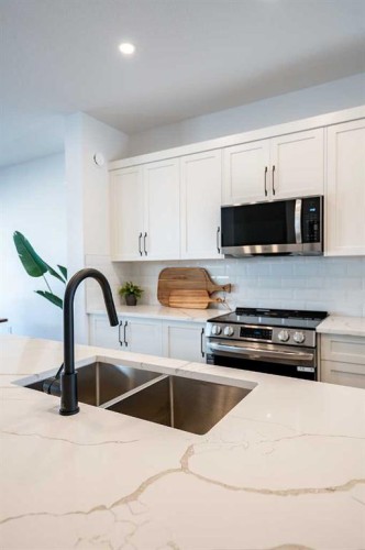 44 Earl Close, Red Deer, AB - Indoor Photo Showing Kitchen With Double Sink