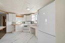 1221 Lucina Street, Penhold, AB  - Indoor Photo Showing Kitchen With Double Sink 