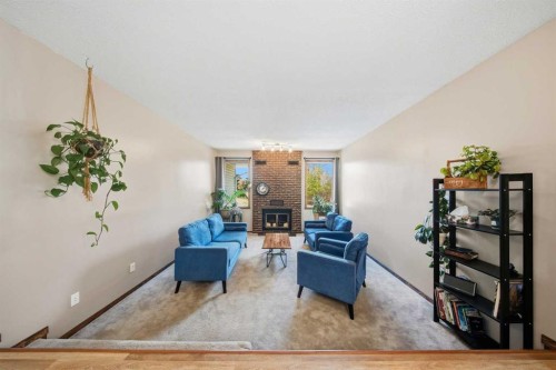 55 Nyman Crescent, Red Deer, AB - Indoor Photo Showing Living Room With Fireplace