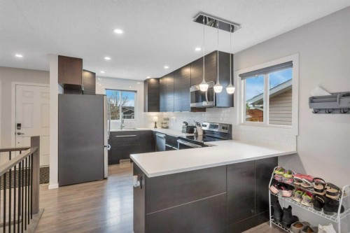 57 Erickson Drive, Red Deer, AB - Indoor Photo Showing Kitchen With Upgraded Kitchen