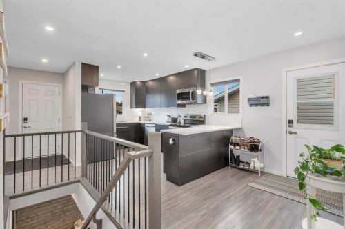 57 Erickson Drive, Red Deer, AB - Indoor Photo Showing Kitchen With Upgraded Kitchen