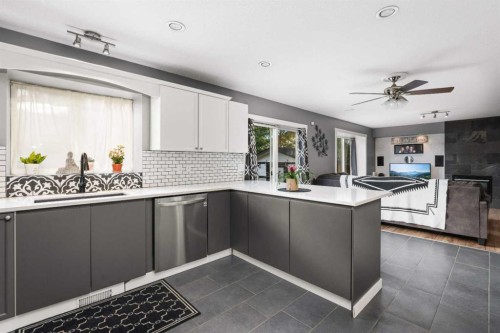 2034 Luxstone Boulevard Sw, Airdrie, AB - Indoor Photo Showing Kitchen