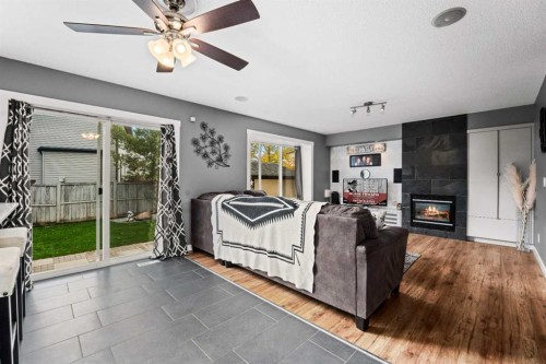 2034 Luxstone Boulevard Sw, Airdrie, AB - Indoor Photo Showing Living Room With Fireplace
