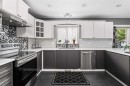 2034 Luxstone Boulevard Sw, Airdrie, AB  - Indoor Photo Showing Kitchen With Upgraded Kitchen 