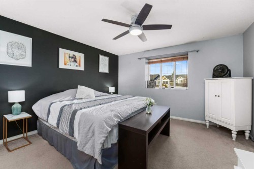 2034 Luxstone Boulevard Sw, Airdrie, AB - Indoor Photo Showing Bedroom