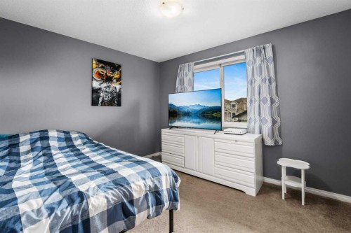 2034 Luxstone Boulevard Sw, Airdrie, AB - Indoor Photo Showing Bedroom
