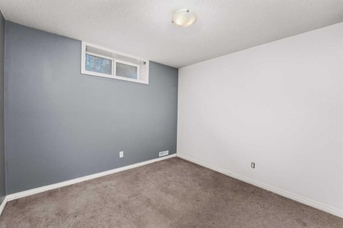 2034 Luxstone Boulevard Sw, Airdrie, AB - Indoor Photo Showing Other Room