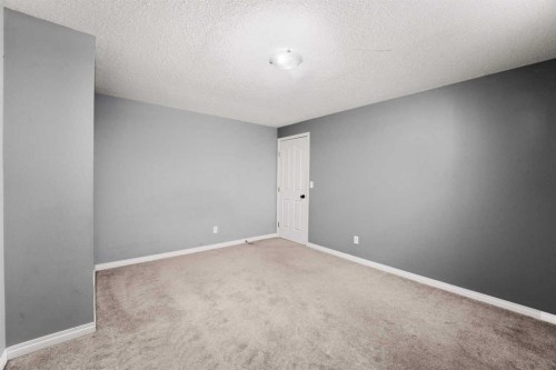 2034 Luxstone Boulevard Sw, Airdrie, AB - Indoor Photo Showing Other Room
