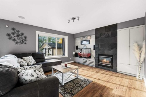 2034 Luxstone Boulevard Sw, Airdrie, AB - Indoor Photo Showing Living Room With Fireplace