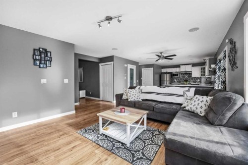 2034 Luxstone Boulevard Sw, Airdrie, AB - Indoor Photo Showing Living Room