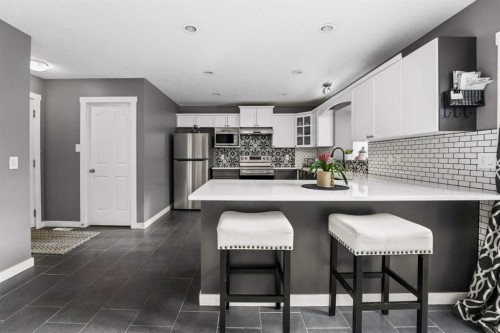 2034 Luxstone Boulevard Sw, Airdrie, AB - Indoor Photo Showing Kitchen With Upgraded Kitchen