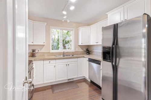 5851 58 Avenue, Red Deer, AB - Indoor Photo Showing Kitchen With Stainless Steel Kitchen With Double Sink