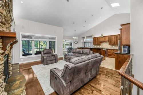 34 Overand Place, Red Deer, AB - Indoor Photo Showing Living Room With Fireplace