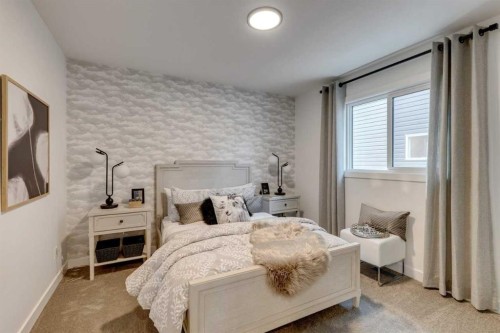 134 Saddlebred Place, Cochrane, AB - Indoor Photo Showing Bedroom
