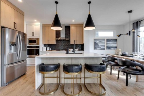 134 Saddlebred Place, Cochrane, AB - Indoor Photo Showing Kitchen With Stainless Steel Kitchen With Upgraded Kitchen