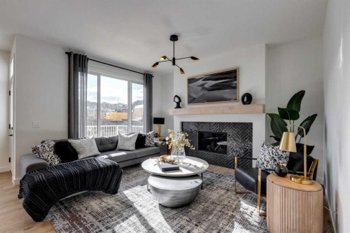 134 Saddlebred Place, Cochrane, AB - Indoor Photo Showing Living Room With Fireplace