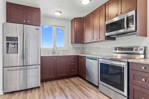 844 Rundlecairn Way Ne, Calgary, AB - Indoor Photo Showing Kitchen With Stainless Steel Kitchen