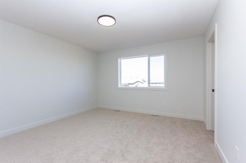 256 Augustus Way, Penhold, AB - Indoor Photo Showing Other Room