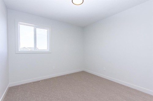 256 Augustus Way, Penhold, AB - Indoor Photo Showing Other Room