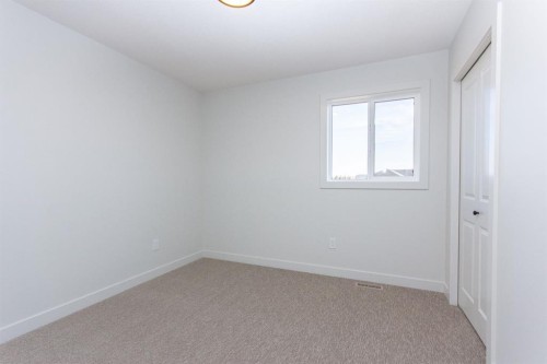 256 Augustus Way, Penhold, AB - Indoor Photo Showing Other Room