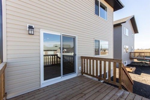 256 Augustus Way, Penhold, AB - Outdoor With Deck Patio Veranda With Exterior