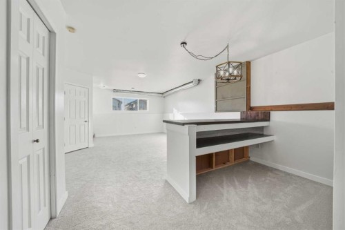 32 Hunter Road, Sylvan Lake, AB - Indoor Photo Showing Other Room