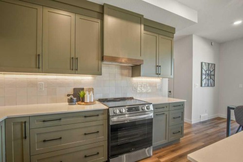 62 Eaton Crescent, Red Deer, AB - Indoor Photo Showing Kitchen With Upgraded Kitchen