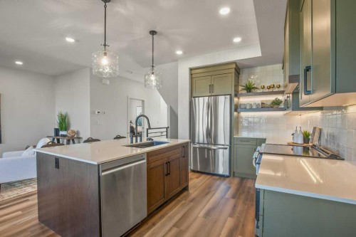 62 Eaton Crescent, Red Deer, AB - Indoor Photo Showing Kitchen With Stainless Steel Kitchen With Upgraded Kitchen
