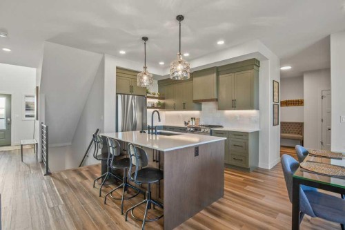 62 Eaton Crescent, Red Deer, AB - Indoor Photo Showing Kitchen With Stainless Steel Kitchen With Upgraded Kitchen