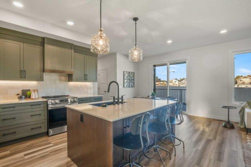 62 Eaton Crescent, Red Deer, AB - Indoor Photo Showing Kitchen With Upgraded Kitchen