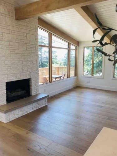 2724 Crawford Road Nw, Calgary, AB - Indoor Photo Showing Other Room With Fireplace