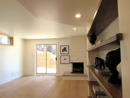 2724 Crawford Road Nw, Calgary, AB - Indoor With Fireplace