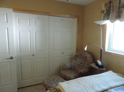 #11 Poor Man Flats Blue 14021  Hwy 53, Rural Ponoka County, AB - Indoor Photo Showing Bedroom