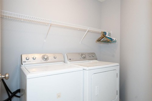 4521 Van Eaton Way, Clive, AB - Indoor Photo Showing Laundry Room