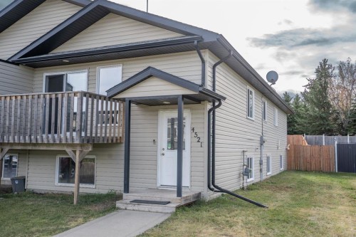 4521 Van Eaton Way, Clive, AB - Outdoor With Exterior