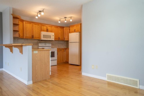 4521 Van Eaton Way, Clive, AB - Indoor Photo Showing Kitchen