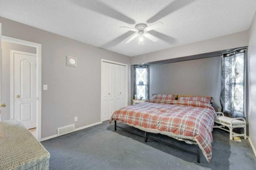 73 Lansbury Close, Lacombe, AB - Indoor Photo Showing Bedroom