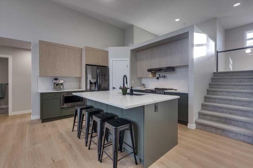 232 Emerald Drive, Red Deer, AB - Indoor Photo Showing Kitchen With Upgraded Kitchen