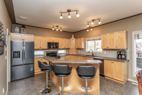 35 Woodrow Close, Red Deer, AB - Indoor Photo Showing Kitchen With Double Sink