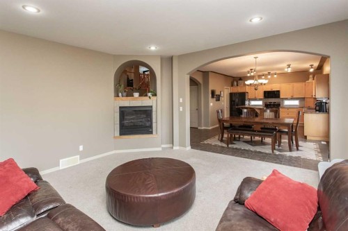 35 Woodrow Close, Red Deer, AB - Indoor Photo Showing Living Room With Fireplace