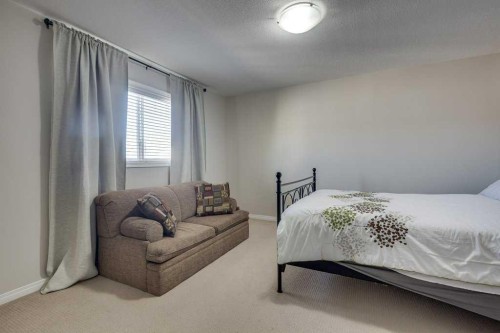 111-50 Lucky Place, Sylvan Lake, AB - Indoor Photo Showing Bedroom