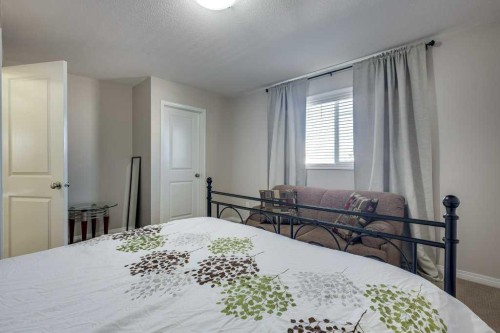 111-50 Lucky Place, Sylvan Lake, AB - Indoor Photo Showing Bedroom