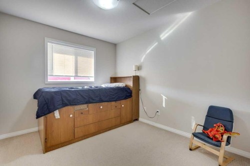 111-50 Lucky Place, Sylvan Lake, AB - Indoor Photo Showing Bedroom