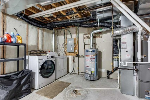 111-50 Lucky Place, Sylvan Lake, AB - Indoor Photo Showing Laundry Room