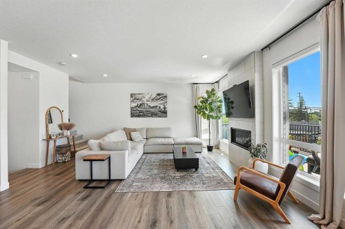 84 Emmett Crescent, Red Deer, AB - Indoor Photo Showing Living Room With Fireplace